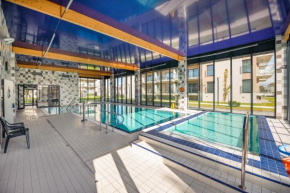 Apartamenty Sun & Snow Pię�� Mórz z basenem, Sianozety
